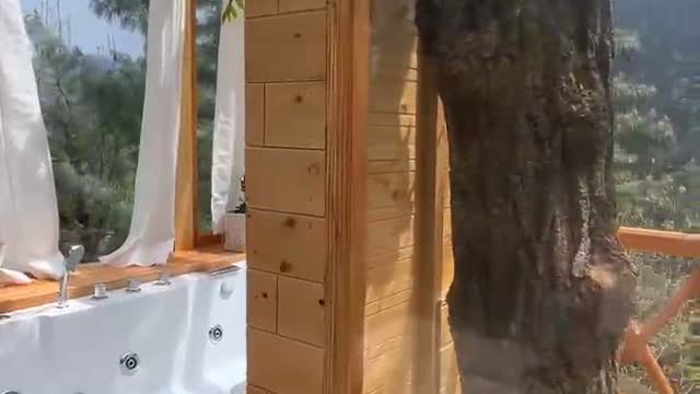 SkyHeaven Jacuzzi Treehouse - Tap to explore photos